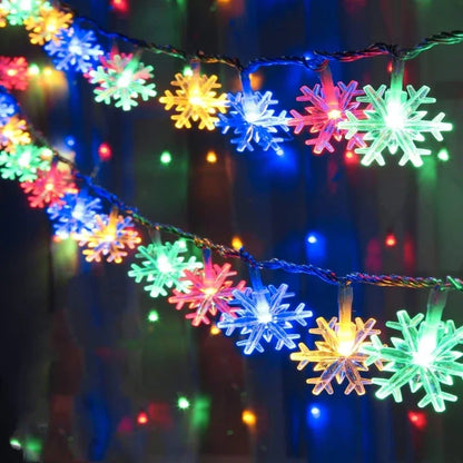 Cascata de Luzes Natalinas em Formato de Floco de Neve